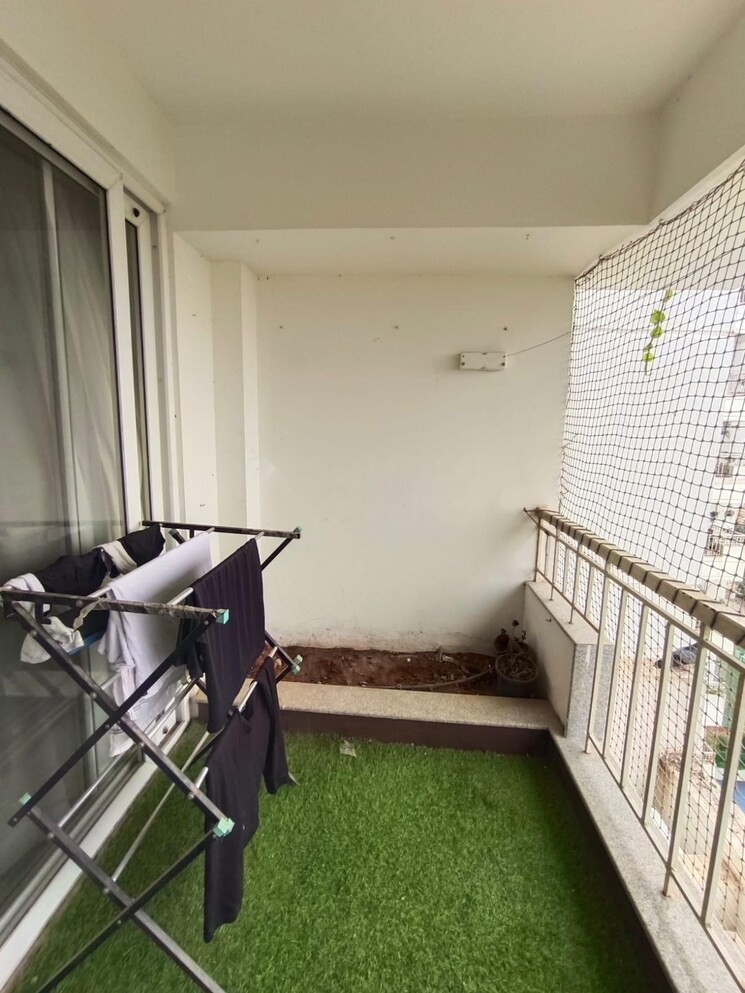 Balcony, uber-verdant 3 Bedroom 1117 Sq.Ft. Apartment In Sarjapur Road Bangalore 8868390