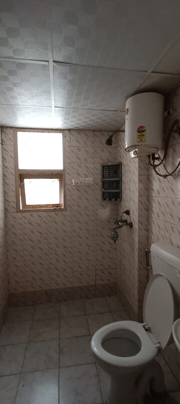 Bathroom in 2 BHK Apartment at Adore Happy Homes, Sector 86 – for Rent