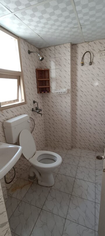 Bathroom in 2 BHK Apartment at Adore Happy Homes, Sector 86 – for Rent