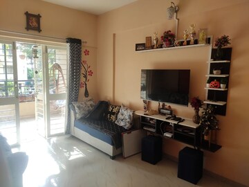 Living Room in 2 BHK Apartment at Arun Celesta Neo, Chikhali – for Rent
