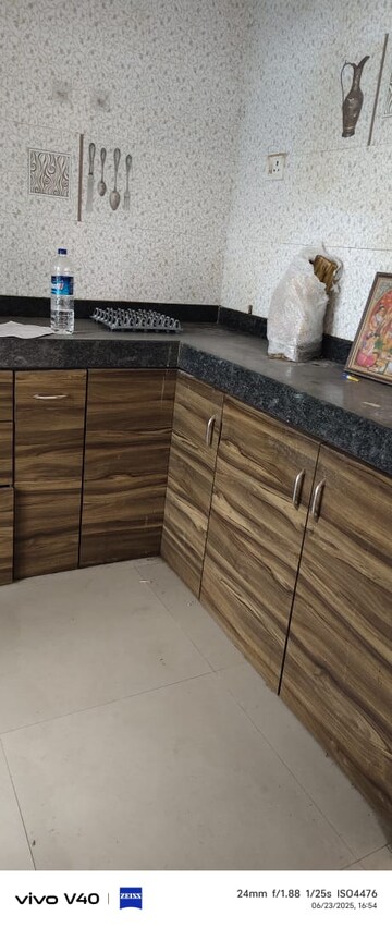 Kitchen in 2 BHK Apartment at Solitaire Heights, Malad West – for Rent