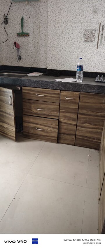 Kitchen in 2 BHK Apartment at Solitaire Heights, Malad West – for Rent