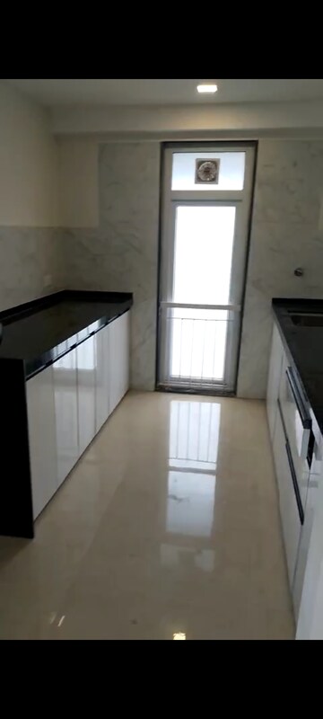 Kitchen in 2 BHK Apartment at Ruparel Ariana, Parel – for Rent