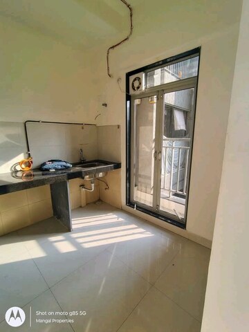 Kitchen in 2 BHK Apartment at Ashar Metro Towers, Vartak Nagar – for Sale