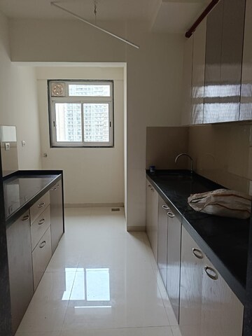 Kitchen in 3 BHK Apartment at Runwal Nirvana, Parel – for Rent