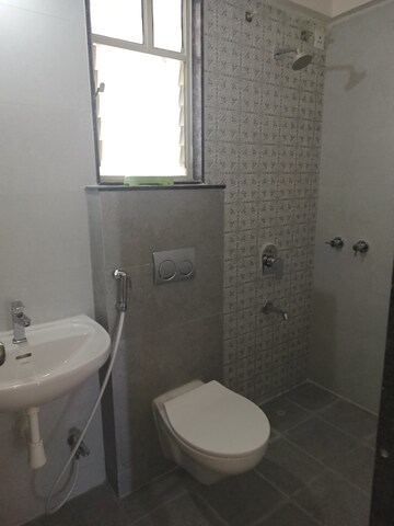 Bathroom in 2 BHK Apartment at Unique K Town, Kiwale – for Rent