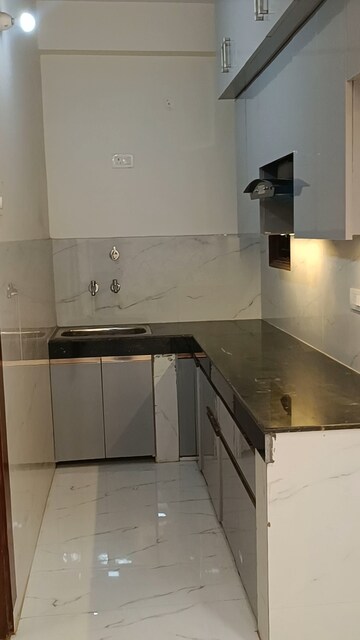 Kitchen in 3 BHK Builder Floor at Shalimar Garden Extension I – for Sale