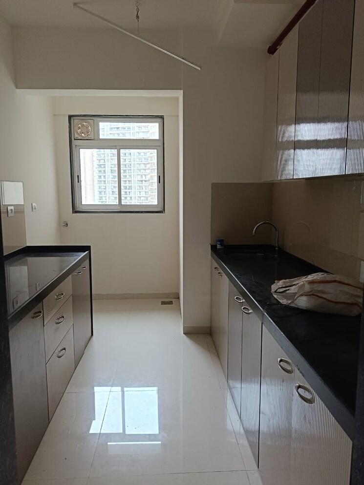 Kitchen, ruparel-ariana 2 Bedroom 804 Sq.Ft. Apartment In Parel Mumbai 8868892