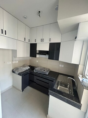 Kitchen in 2 BHK Apartment at Tata Eureka Park, Sector 150 – for Rent