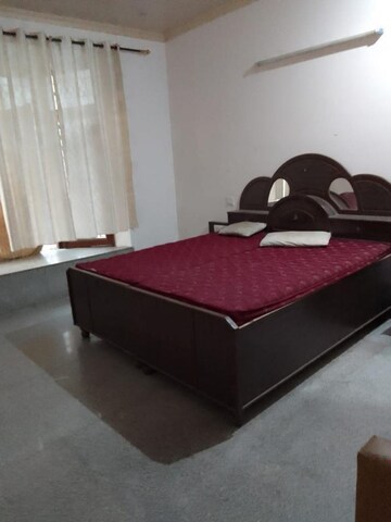 Bedroom in 4 BHK Builder Floor at Chanakyapuri – for Rent