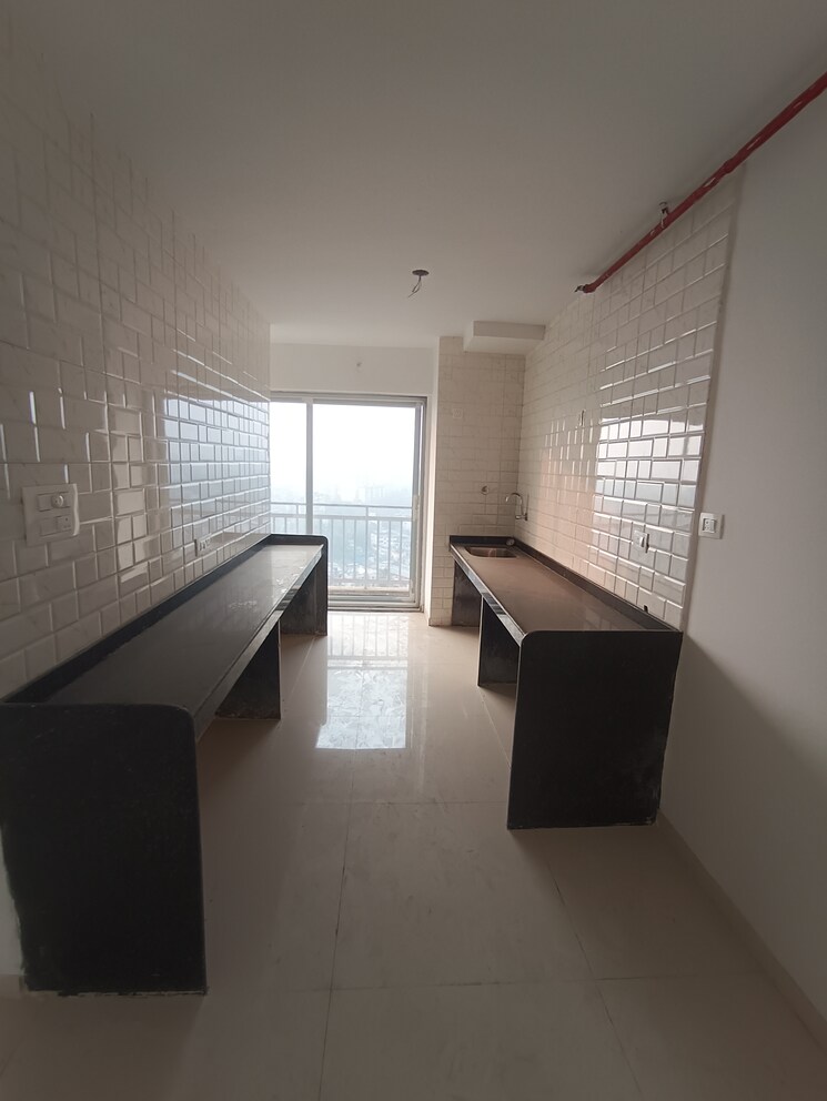 Kitchen, mutha-sai-nirvana 2 Bedroom 1085 Sq.Ft. Apartment In Shahad Thane 8869795