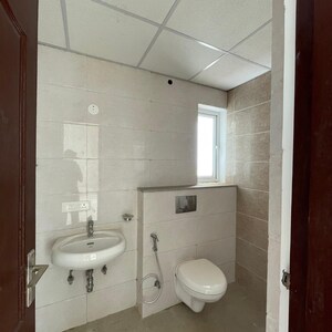 Bathroom in 3 BHK Builder Floor at Zhuku Apartments, Sector 62 – for Sale