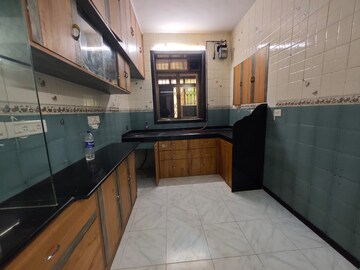 Kitchen in 2 BHK Apartment at Balmurali CHS, Chembur – for Rent