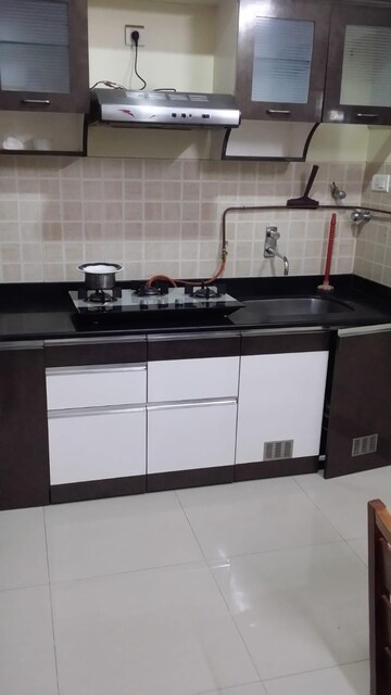 Kitchen in 2 BHK Apartment at Ravetkar Janhavi, Kothrud – for Rent
