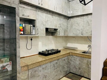 Kitchen in 2 BHK Apartment at Supertech Ecovillage II, Sector 16b Greater Noida – for Rent