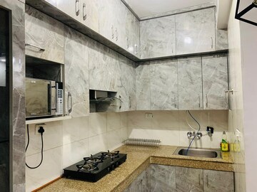 Kitchen in 2 BHK Apartment at Supertech Ecovillage II, Sector 16b Greater Noida – for Rent