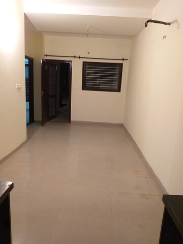 Room in 2 BHK Apartment at Raglan Gulmohar Trends, Dhakoli – for Rent