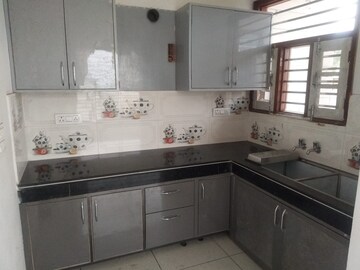 Kitchen in 2 BHK Apartment at Raglan Gulmohar Trends, Dhakoli – for Rent