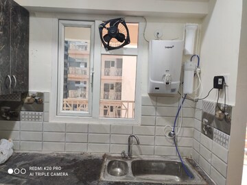 Kitchen in 3 BHK Apartment at Gaur City 7th Avenue, Sector 4 Greater Noida – for Rent