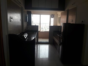 Kitchen in 2 BHK Apartment at GK Roselands Rhythm, Pimple Saudagar – for Rent