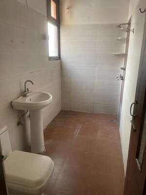 Bathroom in 3 BHK Apartment at Dhakoli – for Sale