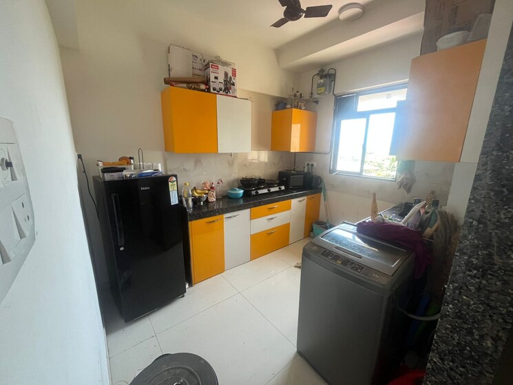 Kitchen, lotus-unity 3 Bedroom 1003 Sq.Ft. Apartment In Versova Mumbai 8871119