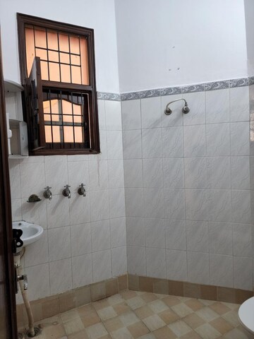 Bathroom in 3 BHK Apartment at Dhakoli – for Rent