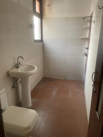 Bathroom in 3 BHK Apartment at Dhakoli – for Rent