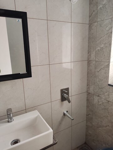 Bathroom in 3 BHK Apartment at Godrej Green Cove, Mahalunge – for Rent