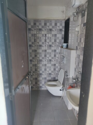 Bathroom in 2 BHK Apartment at Man Opus, Mira Road – for Rent