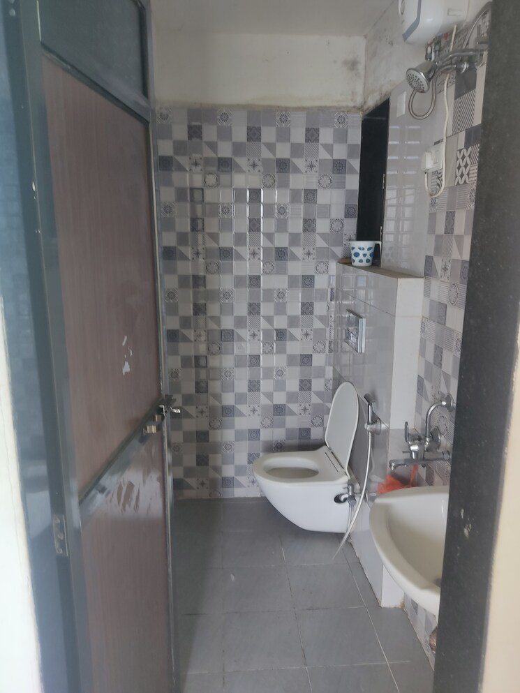 Bathroom, man-opus 2 Bedroom 692 Sq.Ft. Apartment In Mira Road Thane 8871329