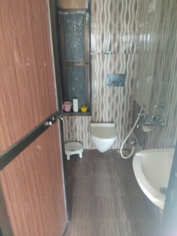 Bathroom in 2 BHK Apartment at Man Opus, Mira Road – for Rent