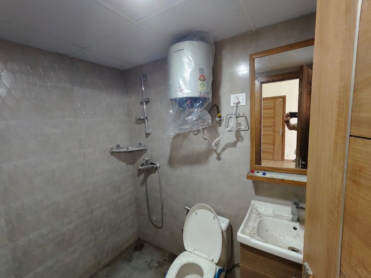 Bathroom, tulip-yellow 3 Bedroom 1704 Sq.Ft. Apartment In Sector 69 Gurgaon 8872392