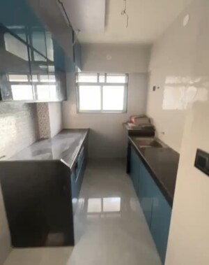 Kitchen in 2 BHK Apartment at Viva Parijat Heights, Nalasopara West – for Sale