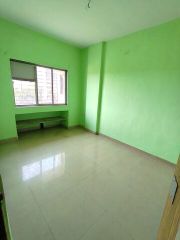 Bedroom in 2 BHK Apartment at Osho Dhara Greens, Khadakpada – for Rent