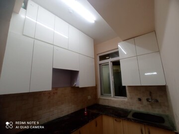 Kitchen in 3 BHK Apartment at Amrapali Dream Valley, Tech Zone 4 Greater Noida – for Rent