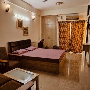 Living Room in 1 RK Apartment at Supertech Eco Suites, Sector 137 – for Rent