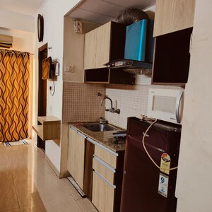 Team Area in 1 RK Apartment at Supertech Eco Suites, Sector 137 – for Rent