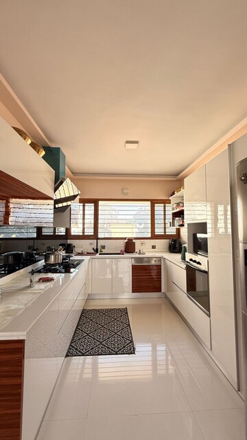 Kitchen in 4 BHK Apartment at Dwaraka Apartments Indiranagar, Indiranagar – for Rent