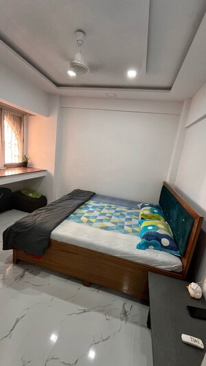 Bedroom in 1 BHK Apartment at Kamlesh Apartment, Andheri East – for Sale