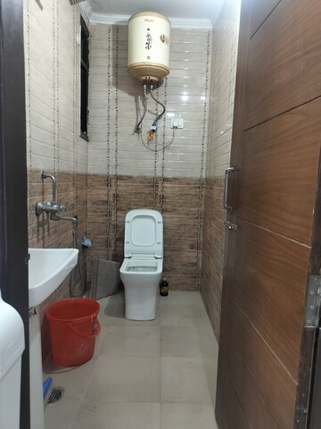 Bathroom in 1.5 BHK Builder Floor at Chattarpur – for Rent