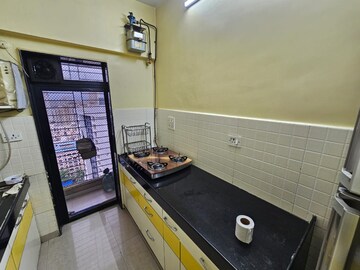 Kitchen in 2 BHK Apartment at Lalani Residency, Pratha Pushp Society – for Rent