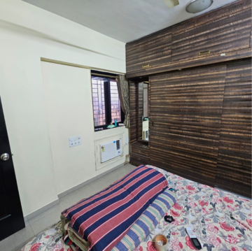 Bedroom in 2 BHK Apartment at Lalani Residency, Pratha Pushp Society – for Rent