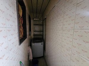 Building Lobby in 2 BHK Apartment at Lalani Residency, Pratha Pushp Society – for Sale