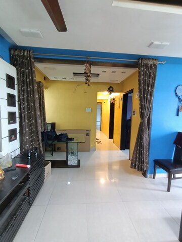 Living Room in 2 BHK Apartment at Siddhi Highland Park, Kailash Nagar – for Rent