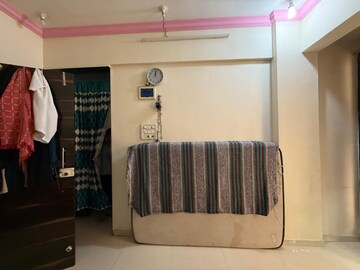 Bedroom in 2 BHK Apartment at Om Shree Vinayak, Seawoods – for Rent