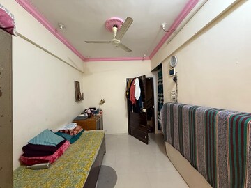 Bedroom in 2 BHK Apartment at Om Shree Vinayak, Seawoods – for Rent