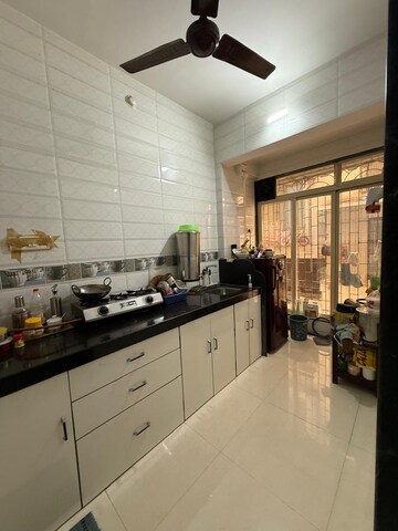 Kitchen in 2 BHK Apartment at Om Shree Vinayak, Seawoods – for Rent