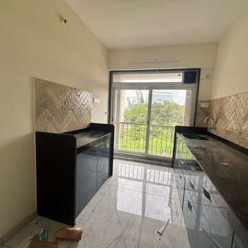 Kitchen in 2 BHK Apartment at Shreenathji Delta Heights, Ulwe Sector 5 – for Rent