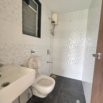 Bathroom in 2 BHK Apartment at Shreenathji Delta Heights, Ulwe Sector 5 – for Rent